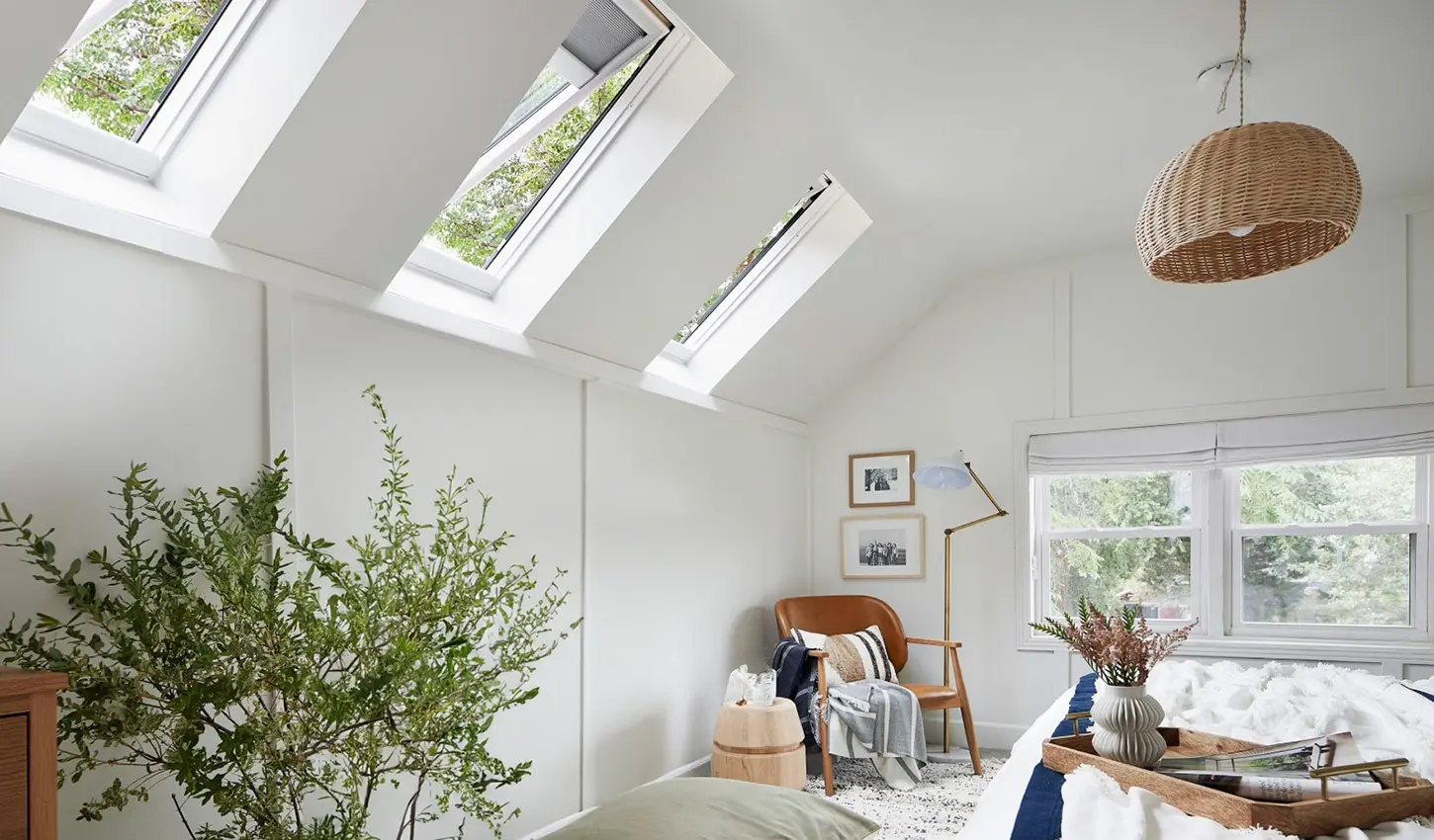 Bedroom illuminated by new skylights