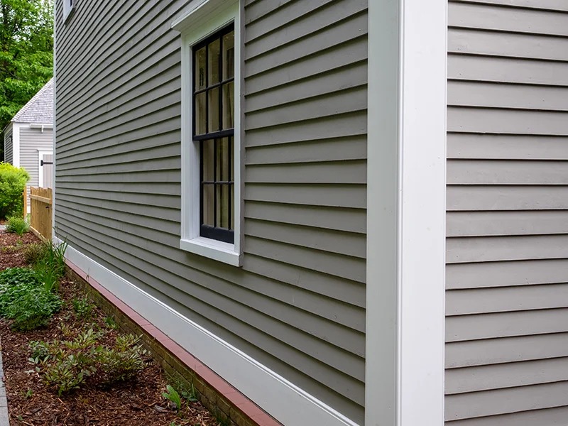New gray siding on home